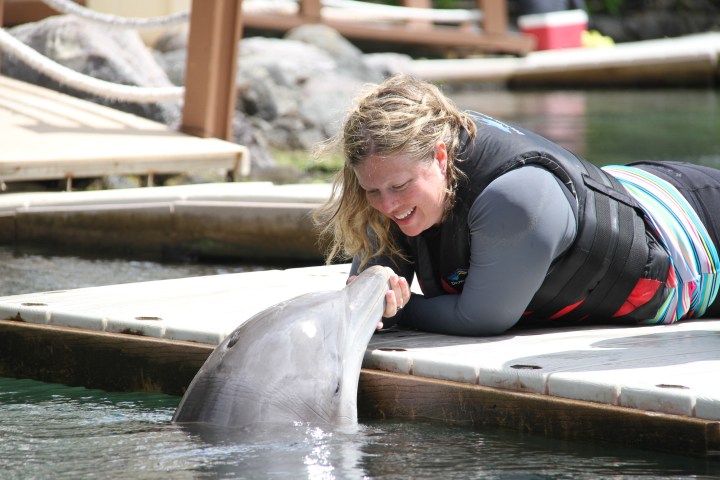 woman with dolphin