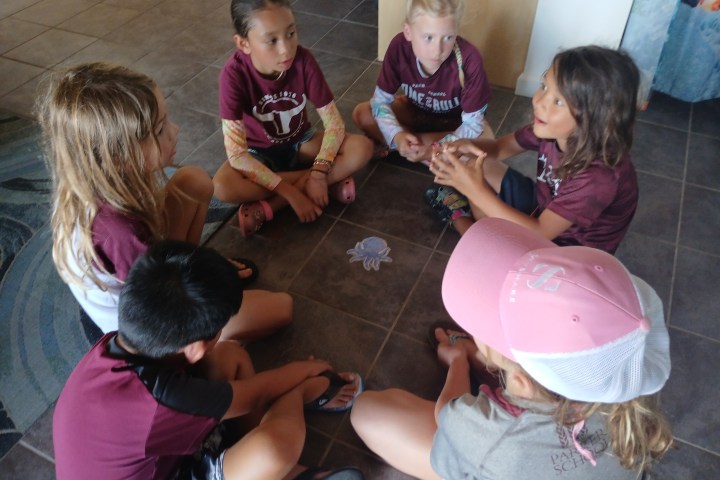 a group of people sitting at a party