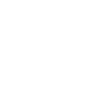 Silhouette of a person teaching three others with a presentation board.